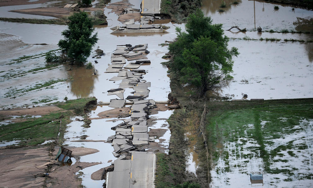Preparing Communities For The Rising Risk Of Flooding In Face A Road Ripped Apart By Flooding River