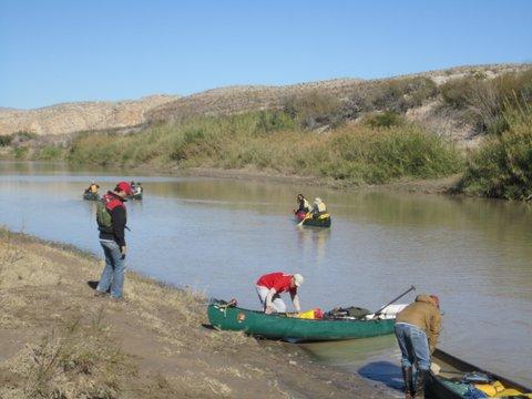 People canoeing down Rio Grande