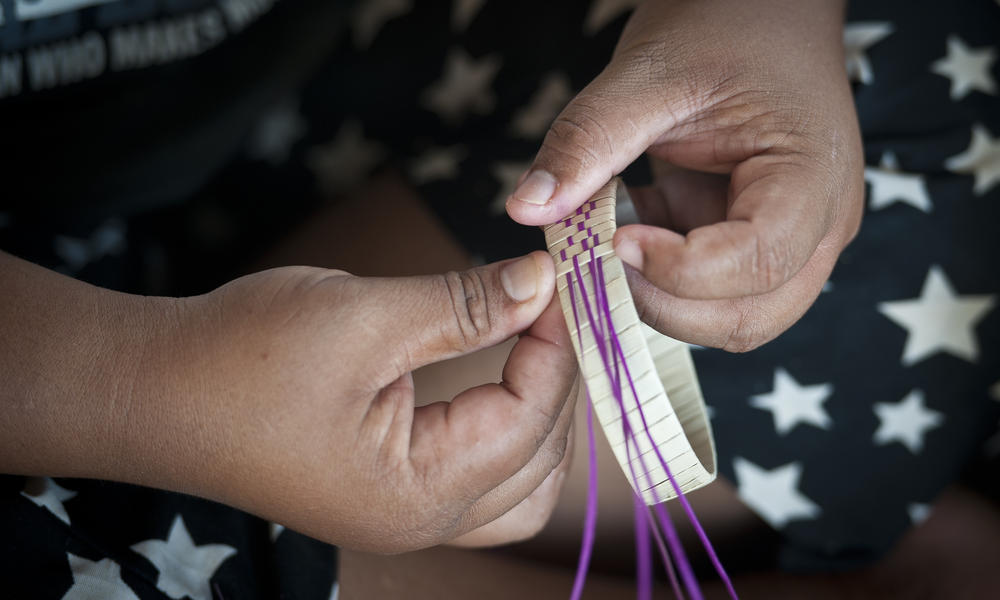 weaving a bracelet