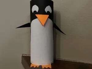 Toilet paper roll decorated like a penguin
