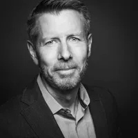 A headshot of John E. Morton