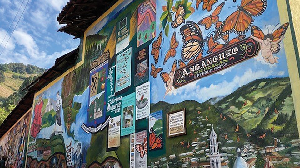 Mural of monarchs on building