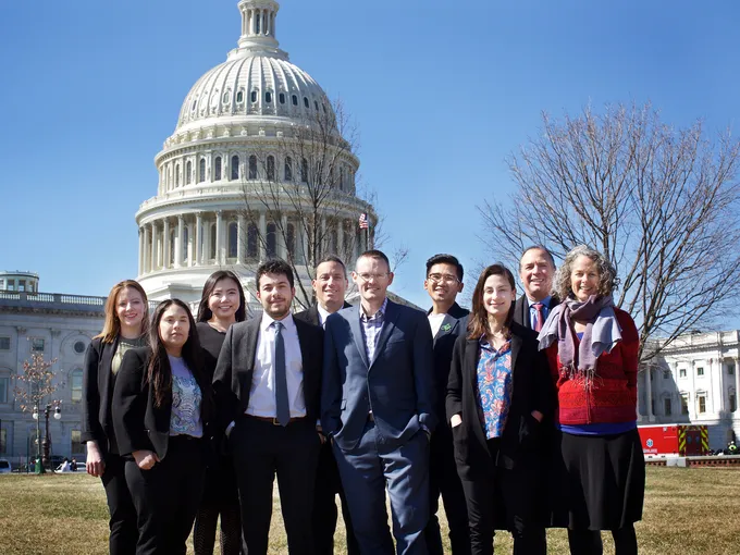 Group photo in front of the US Capitol buidling of all nine Panda Ambasadors who particpated in Lobby Day and Jessica Lazarus, WWF staff lead of the Panda Ambassador program