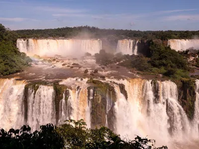 Iguaçu Falls, an Atlantic Forest treasure on the border of Brazil and Argentina, is the largest waterfall system in the world, consisting of a network of 275 waterfalls spanning nearly 3 kilometers wide.