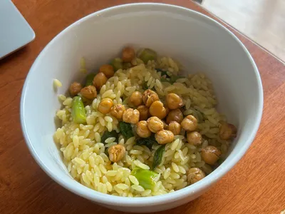 A vegetarian bowl of orzo and chickpeas
