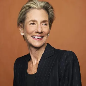 A professional portrait of a woman wearing black.