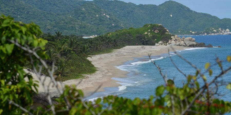 A scenic overlook of a beach in Colombia