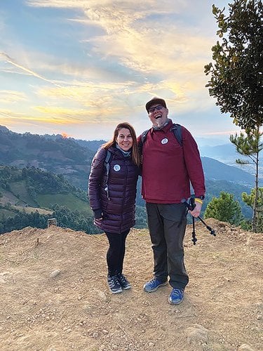 Two teachers on hilltop