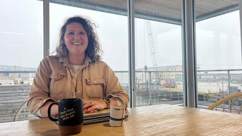 Kate Weiler in her office overlooking Casco Bay.