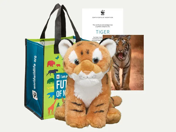 Tiger adoption kit with a plush, reusable bag, and adoption certificate