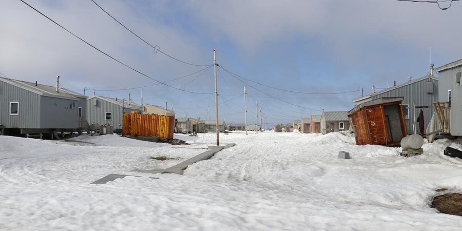 A view through the village of Savoonga in the snow