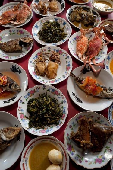 several plates of food laid out on a table