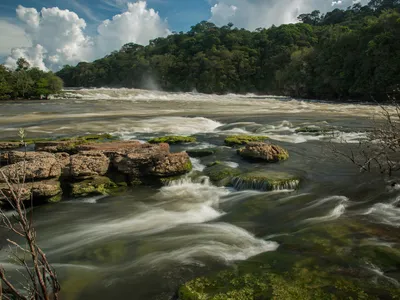 Landscape photo of the peaceful São Simão Falls at Juruena River in the Amazon.