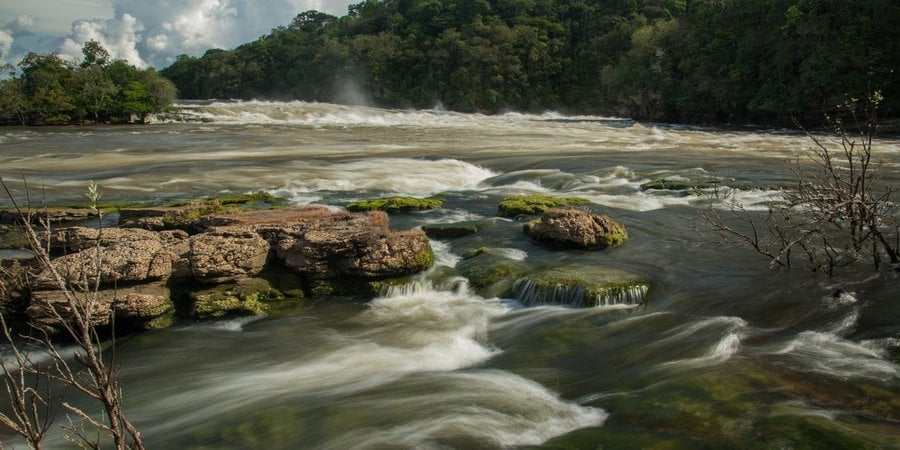 Landscape photo of the peaceful São Simão Falls at Juruena River in the Amazon.