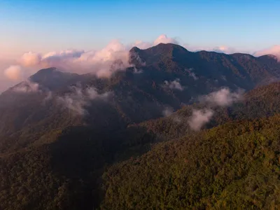 Aerial photograph of clouds and mountains in the Sierra Nevada de Santa Marta mountain rage of Colombia.