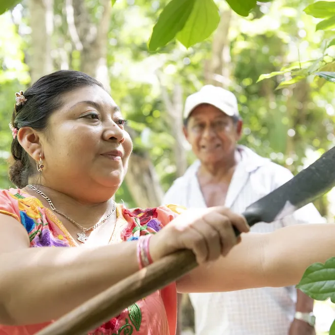 Rosa Cuxin Padilla and Francisco Canul Poot oversee the garden at the Yaxunah Community Center in Yucatan, Mexico