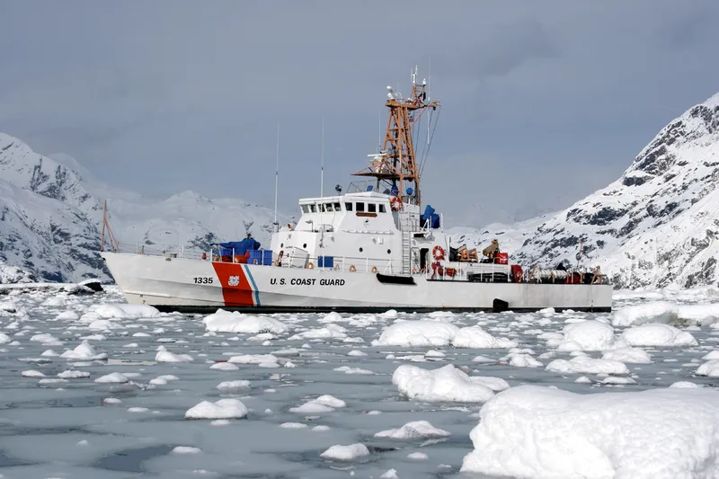 United States Coast Guard cutter Anacapa sails through icey waters in Glacier Bay, Alaska.