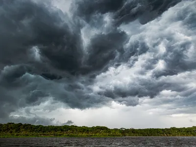 A large storm over a water body