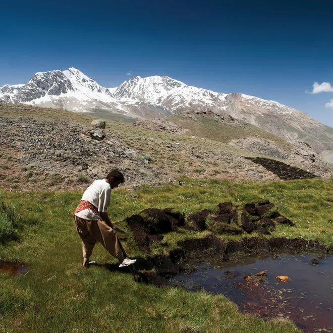 Extracting peat for fuel, Broghil National Park, Khyber Pakhtunkhwa, Pakistan