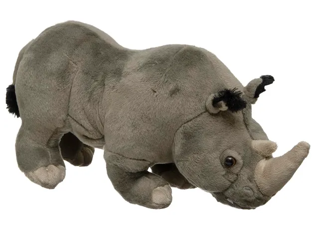An African rhino plush against a white background