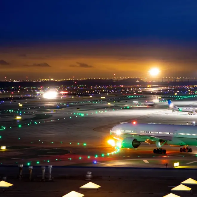 An airport at sunset