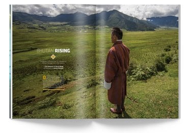 Magazine spread showing photo of man in Bhutan