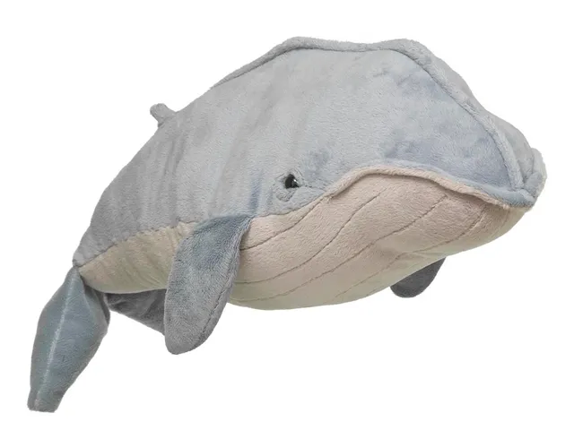 A blue whale plush against a white background