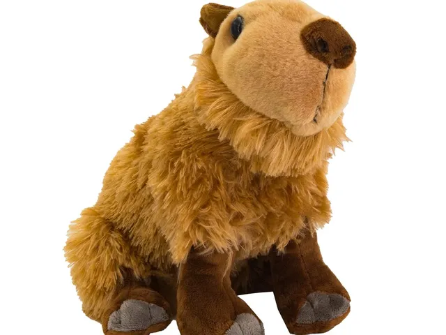A capybara plush against a white background
