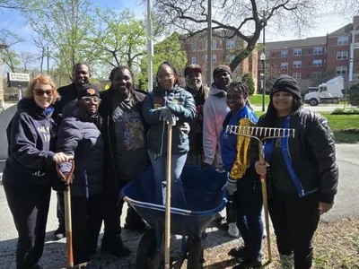Group of adults restoring a park