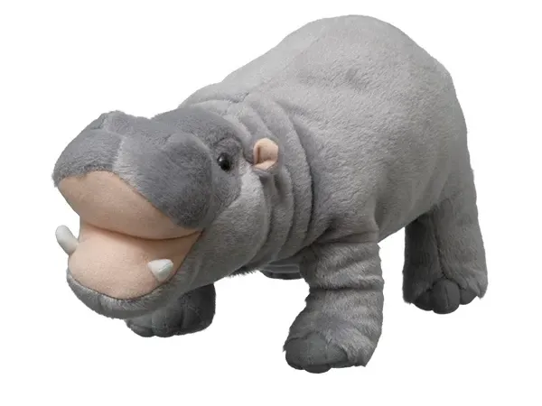A hippopotamus plush against a white background