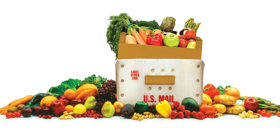 Vegetables overflowing a mail container
