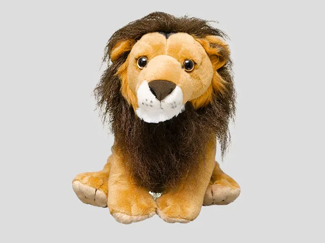 Lion plush against a gray background