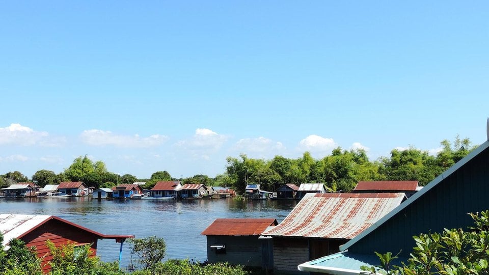 A floating village in Cambodia on a sunny day