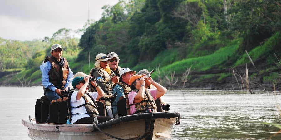 Tourists in boat on Amazon