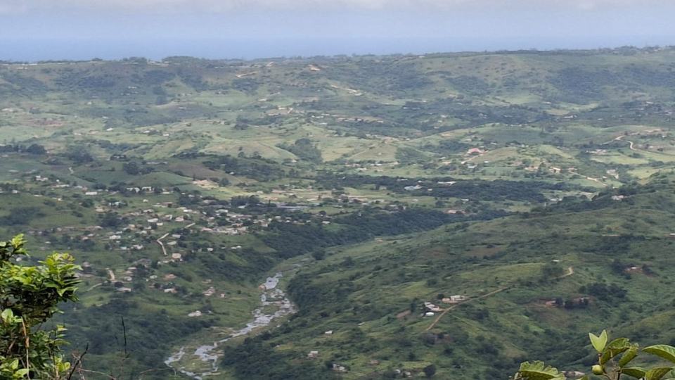 Aerial photo of a valley with many homes and farms