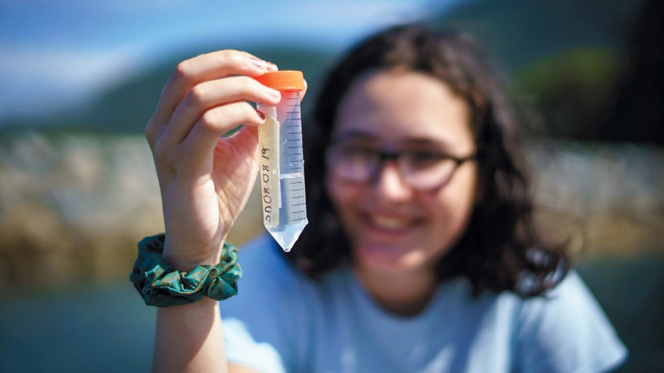 Muriel Reid holding up water test