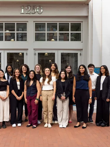 Large group of 2024 BRIDGE program interns in front of WWF-US Headquarters