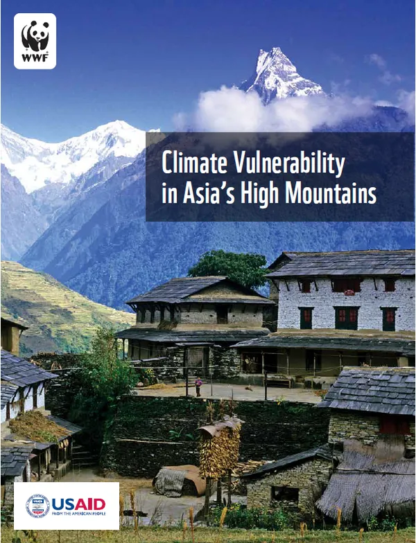 Report cover featuring buildings set against backdrop of snow-capped mountains
