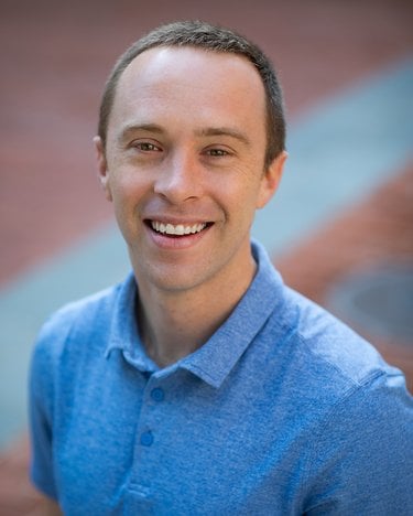 Headshot of Alex Nichols-Vinueza