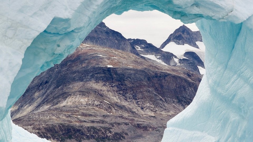 Natural arch made of glacier ice
