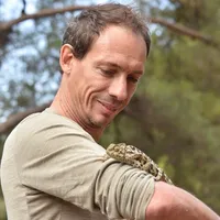 Arnaud Lyet with a chameleon