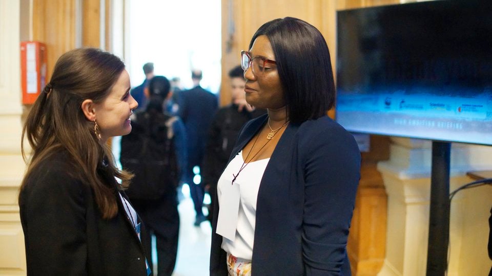 Meredith Soward chats with Betty Osei Bonsu at an event