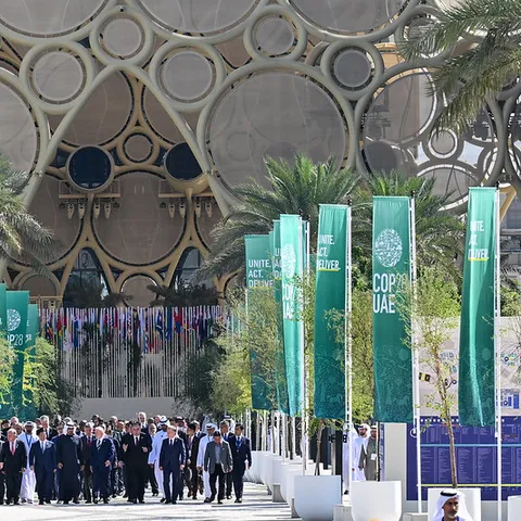 Leaders walk out of the COP28 pavilion in Dubai