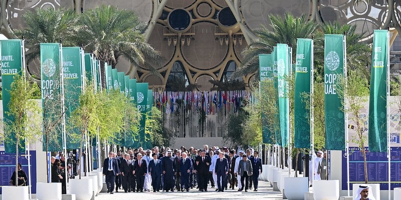 Leaders walk out of the COP28 pavilion in Dubai