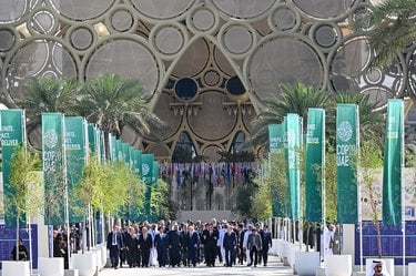 Leaders walk out of the COP28 pavilion in Dubai
