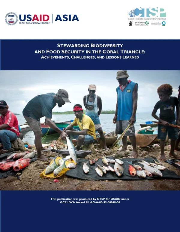 A report cover showing a group of people on a beach looking at a fishing catch laid out on a tarp over the sand