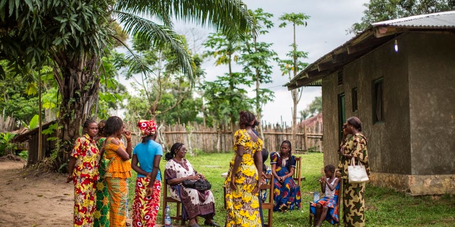 A group of women gather to discuss local conservation issues in the Democratic Republic of Congo