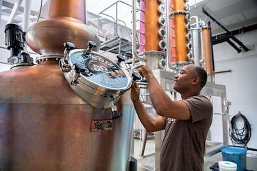 Williams family at work inside Delta Dirt Distillery