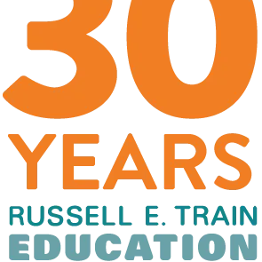 Graphic text in orange and teal that reads 30 years Russell E. Train Education for Nature