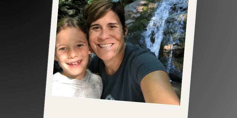 Skye and Erin in front of a waterfall